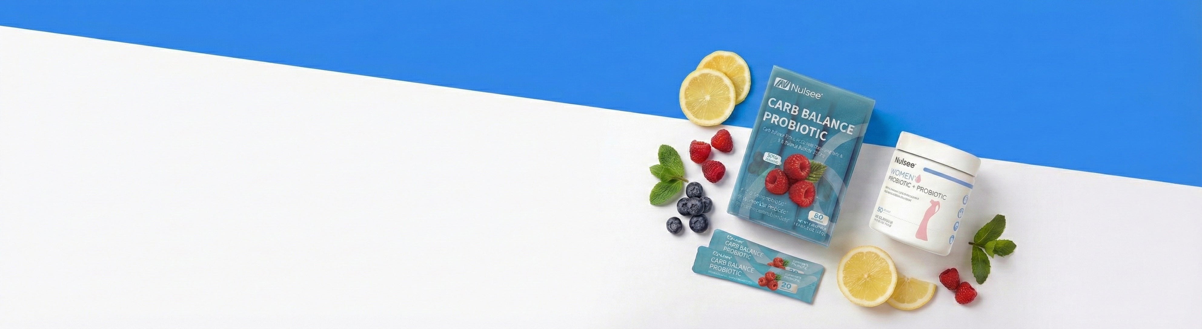 Diagonal sky-blue and white banner with probiotic bundle products scaled down on the right, fruit accents around them, and large blank space on the left for headline
